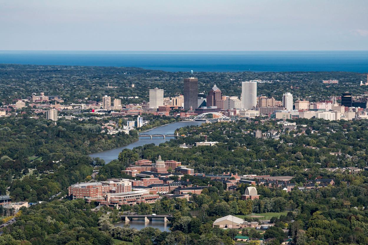 Aerial image of University of Rochester with city of Rochester in background