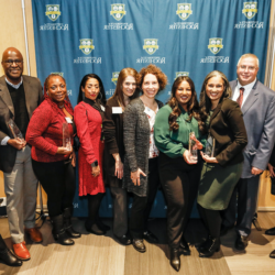 President Magelsdorf and Dr Adrienne Morgan pose with the 2024 Presidential Stronger As One Diversity Award winners during the reception in Feldman Ballroom January 25, 2024. // Matt Wittmeyer为澳门威尼斯人网上赌场拍摄