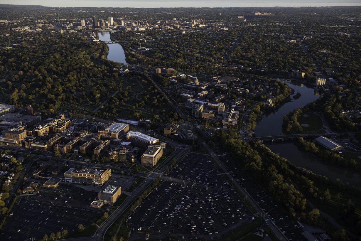 aerial photo of the University of Rochester campuses with the city of Rochester in the background