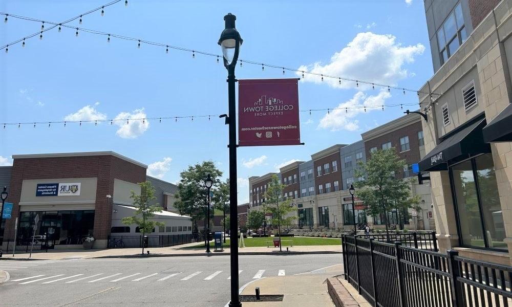 College Town banner on a pole in the mixed-use development.