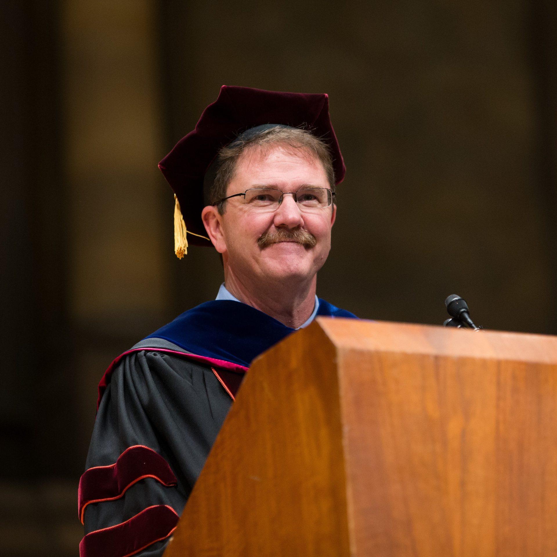 Robert Clark speaking at Commencement